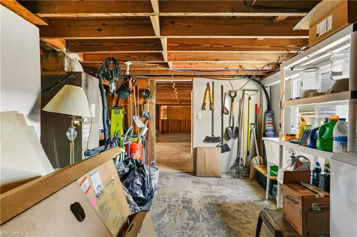 Basement with light tile patterned floors