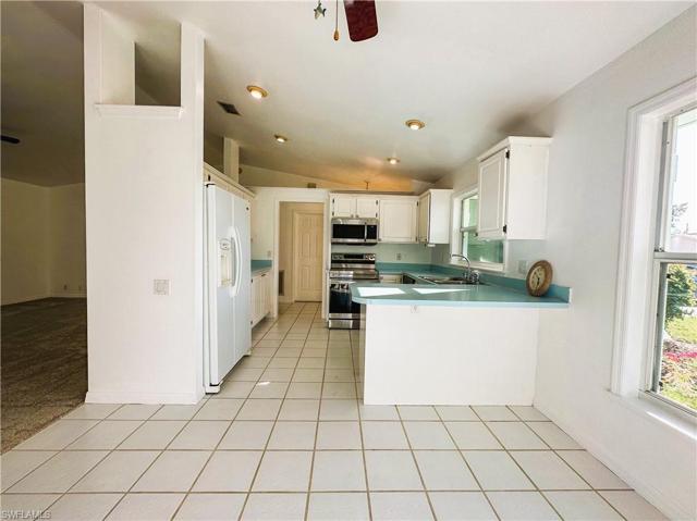 dining area with view of kitchen
