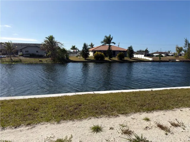 Water view with nearby suburban area