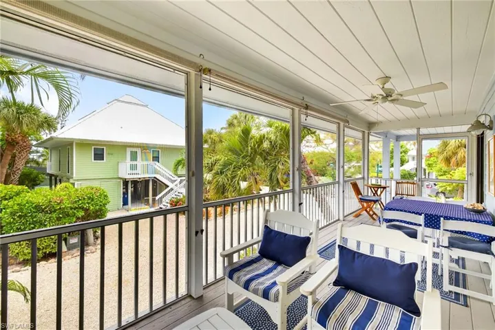 Sunroom / solarium with ceiling fan and plenty of natural light