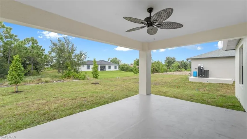 View of patio with a ceiling fan