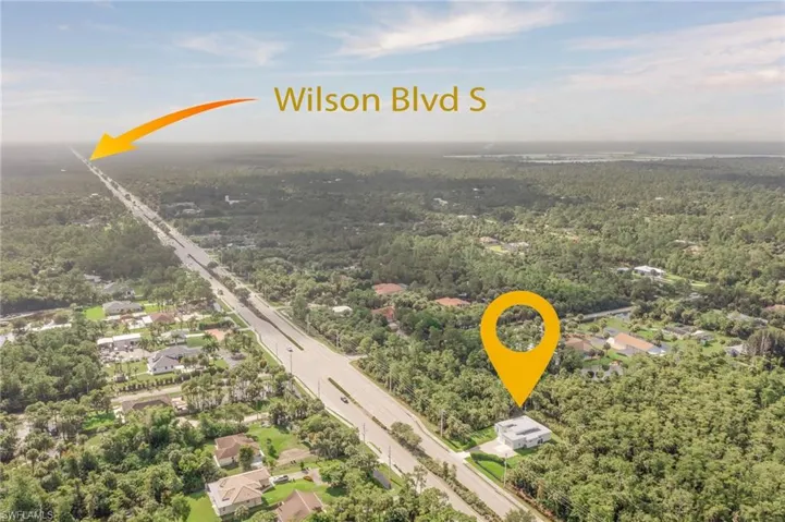 Aerial view with a wooded view