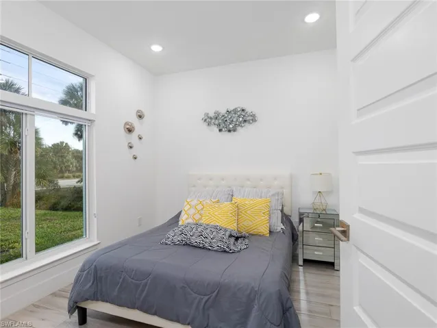 Bedroom featuring recessed lighting and light wood-type flooring