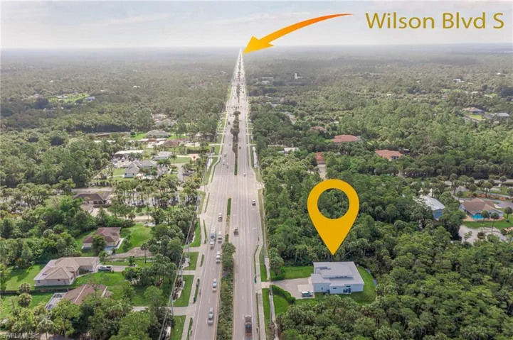 Aerial view with a wooded view