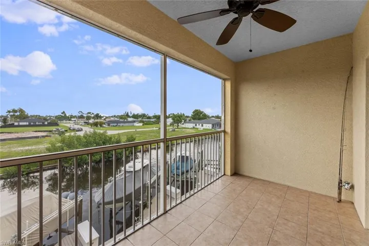 Balcony featuring ceiling fan