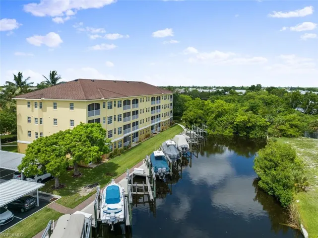 Property view of water featuring a boat dock