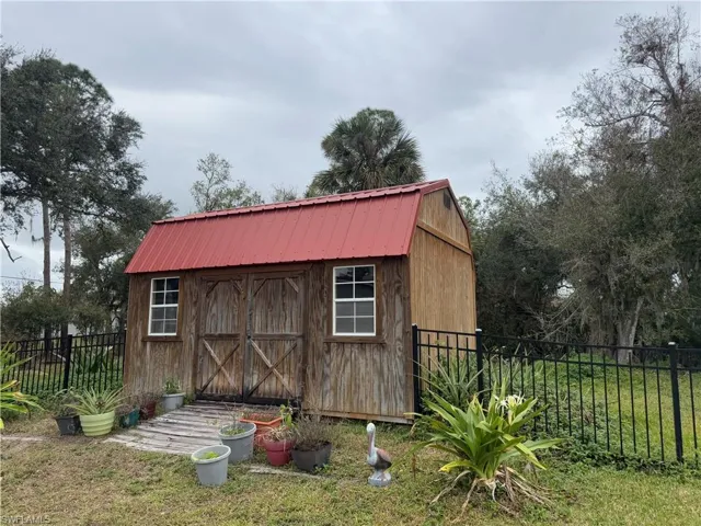 View of outdoor structure/shed on attached lot