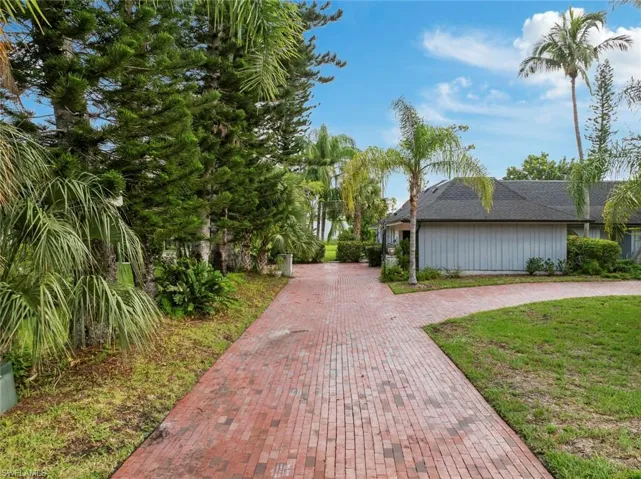 View of driveway and front portion of house