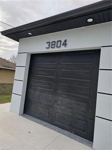 Garage with refrigerator
