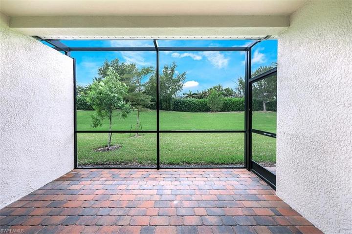 The screened lanai faces a private and quiet landscaped yard. The lanai can be expanded to accommodate a pool or just to add more outdoor space.