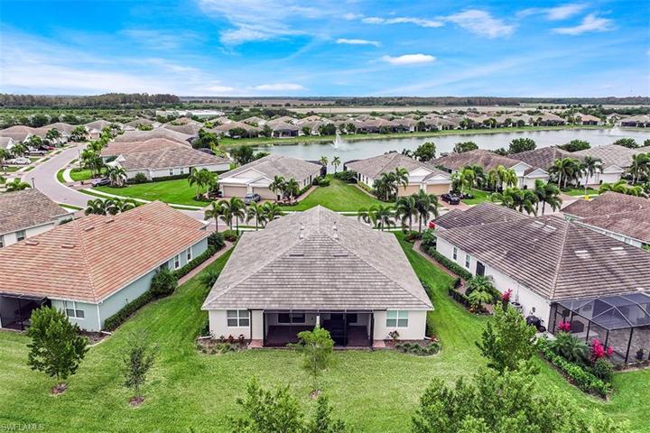 The villa's lanai (above left) can be expanded for more outdoor living space. The lanai, far right, is a good example of size.