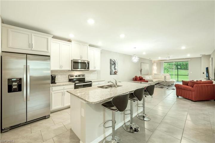 This spacious and open floor plan features 2 bedrooms, 2 full baths, den/study, screened lanai, laundry room, and 2-car garage.