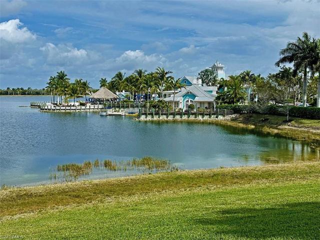 Lakeside resort-style amenities at Naples Reserve include lagoon-style pool with lap lanes, restaurant, pool-side Tiki bar, sandy beach, beach volleyball, fully equipped gym, tennis, pickleball, bocce ball, dog parks, and complimentary electric boats, kayaks, and paddleboards to enjoy on picturesque Eagle Lake.