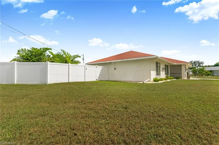 View of home's exterior with stucco siding