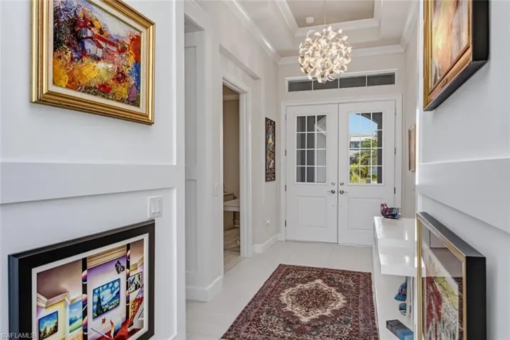 A bright, elegant welcome with soaring ceilings and timeless coastal design.