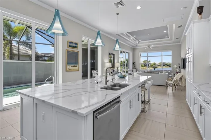 Designed for entertaining with views from the courtyard pool to the lake beyond.