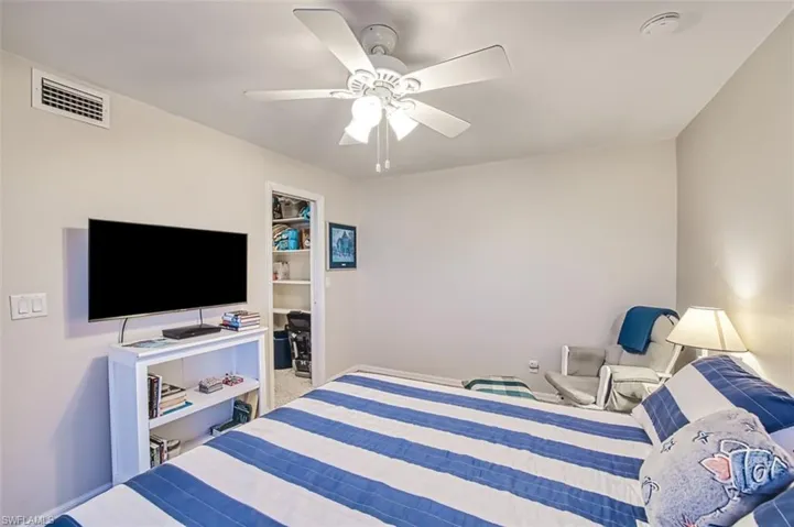 Bedroom featuring a closet and ceiling fan