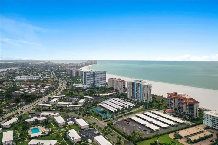 View of urban area with expansive beach