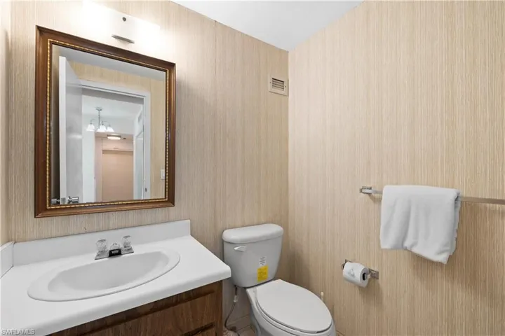 Bathroom featuring vanity and toilet