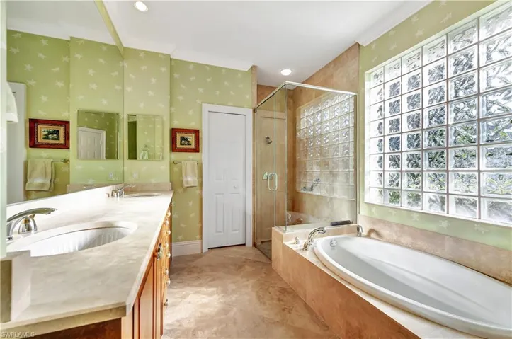 Updated Bathroom with independent shower, bath and raised vanity