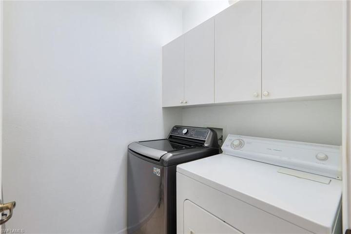 Utility Room with great overhead storage!