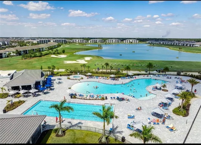 Drone / aerial view of a golf club and a large body of water