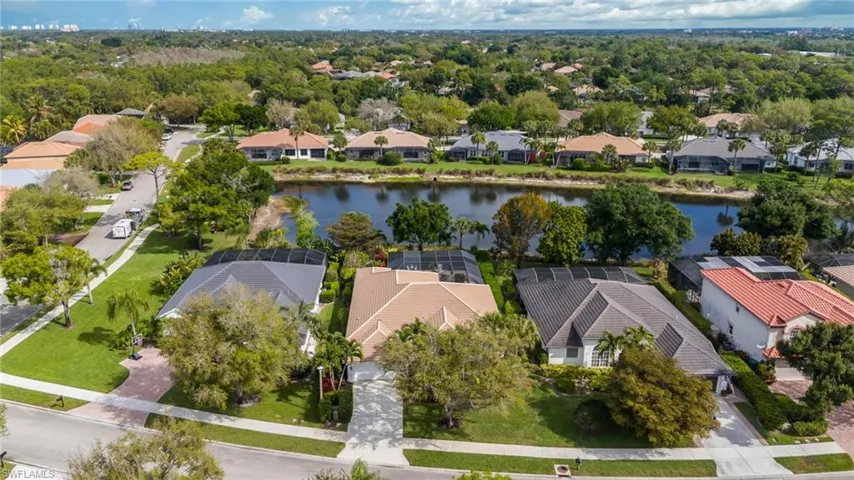 Aerial view of residential area with a nearby body of water
