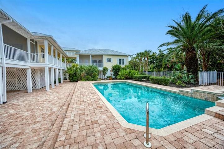 Custom Paver Sun Deck. Lush Landscaping Surrounds Pool an Spa!