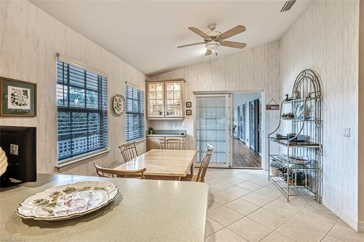 Vaulted Eat-in Kitchen. Walk-out to Deck. Enjoyable Natural Light