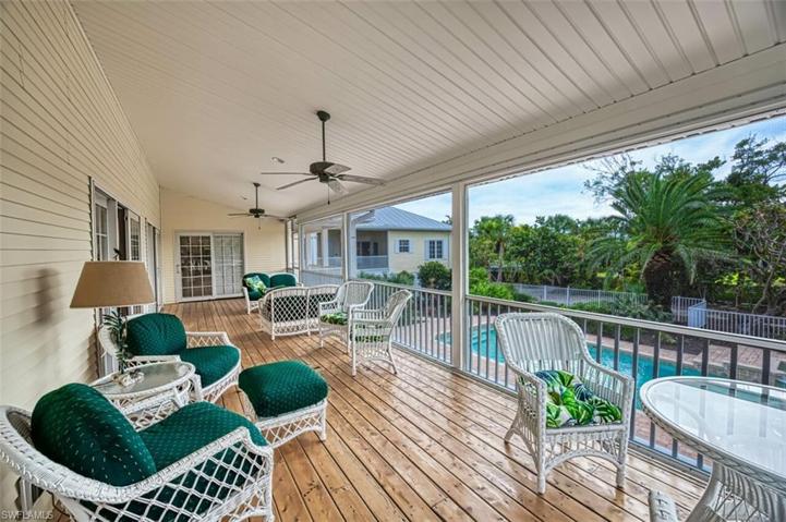 Extended Living Space! Screened Covered Balcony/Porch Overlooks Pool and Spa