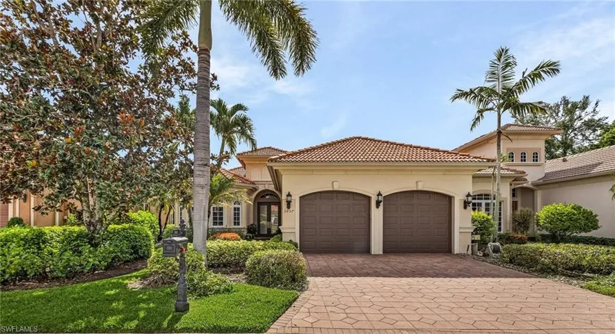 Mediterranean / spanish home with two car garage