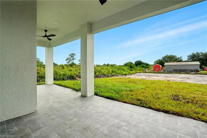 View of patio / terrace with a ceiling fan