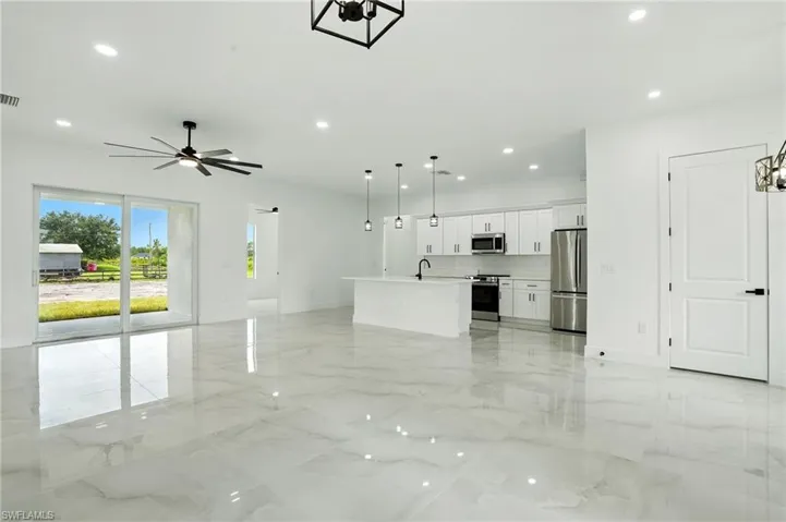 Full bathroom featuring vanity and combined bath / shower with glass door