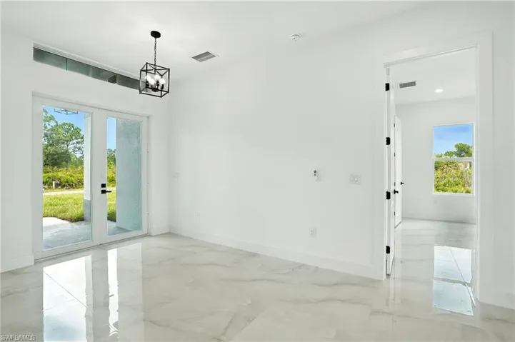 Unfurnished living room featuring recessed lighting, a ceiling fan, and light marble finish floors
