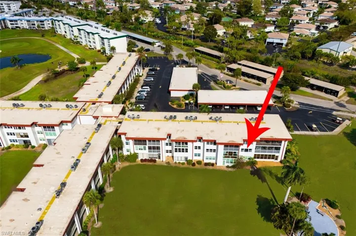 Bird's eye view of a nearby body of water and a local golf course