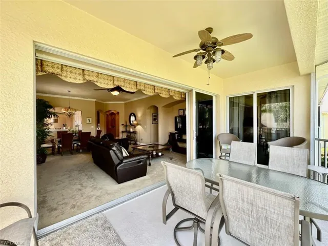 Large lanai with pocketing sliders to living and master bedroom
