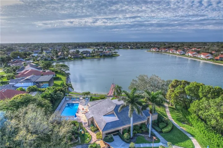 Aerial view with a water view and a residential view