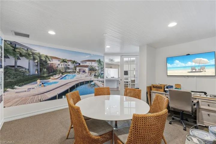 Dining space featuring carpet flooring, recessed lighting, and an office area