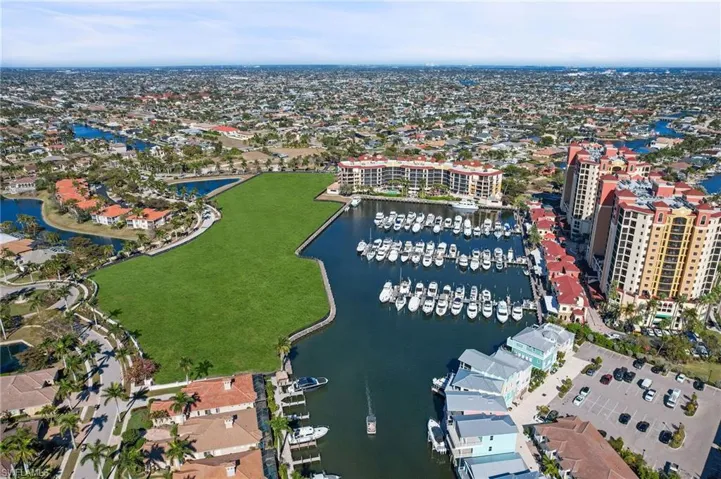 View of property location with a nearby body of water