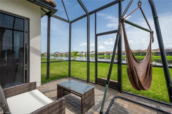 Sunroom with a water view