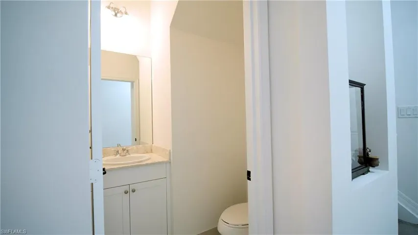 Bathroom with vanity and toilet
