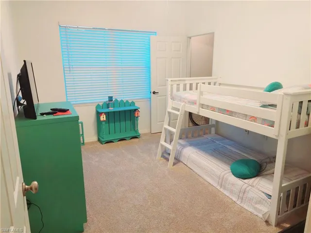 Guest bedroom with another walk-in closet