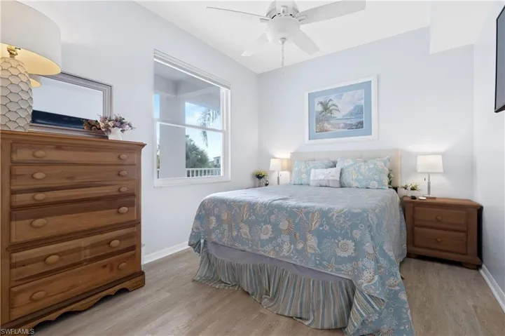 Gues Bedroom featuring light wood-style flooring and ceiling fan