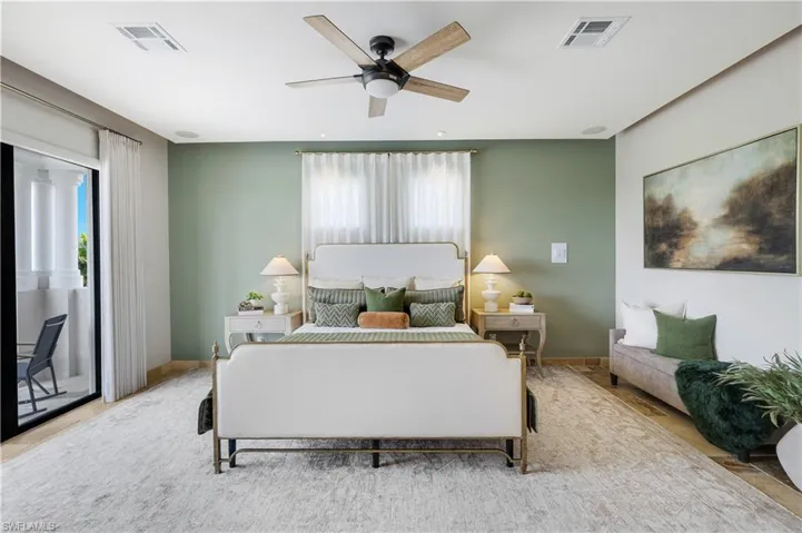 Bedroom featuring access to exterior and ceiling fan