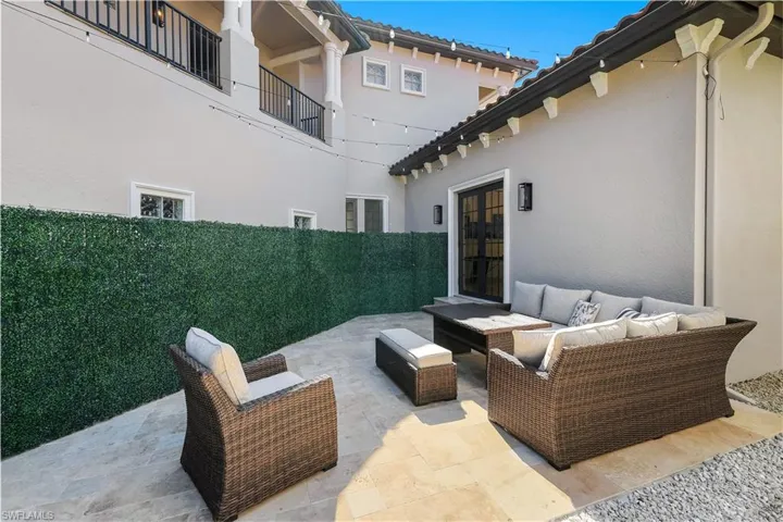 Patio / terrace featuring a patio, french doors, and outdoor lounge area