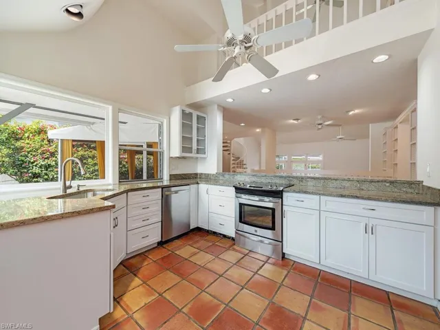 Eat in Kitchen with Counter Open to Dining and Living Room