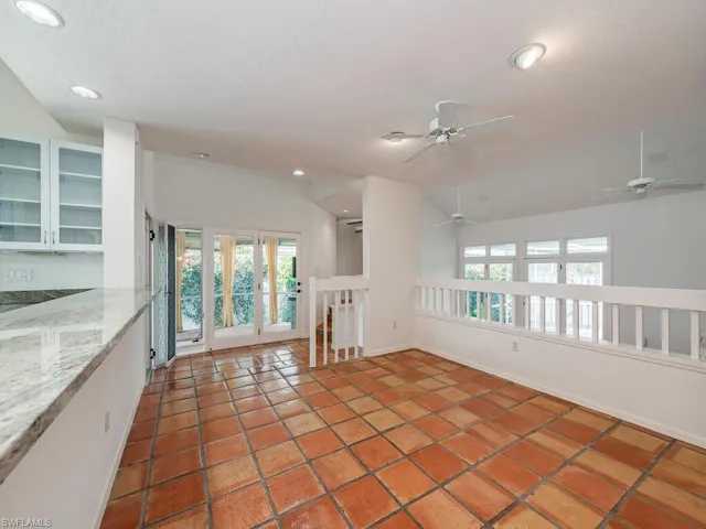 Dining Area off Kitchen open to the Living Room and  Covered Screened Porch