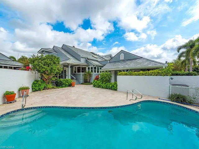 Sunny Private Oversized Pool Deck recently Resurfaced Pool to Front Entry, Screened Covered Porch and 3rd Bedroom Porch