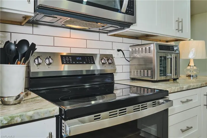Beautiful subway tile backsplash.
