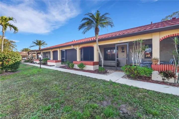 View of front of house with a front yard